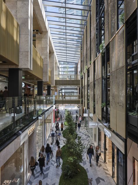 Turning the traditional idea of the ‘shopping mall’ inside out, Commercial Bay presents a new model for the retail typology: an open-air, laneway-based retail environment configured over three levels. The project embodies a spirit of generosity, creating two entirely new pedestrian routes through the city block, connecting transit nodes, and enhancing the pedestrian experience of the city center. Shopping Complex Design, Open Mall Design, Mall Plan, Atrium Ideas, Shopping Center Design, Atrium Building, Mall Atrium Design, Modern Mall Architecture, Mall Architecture Exterior