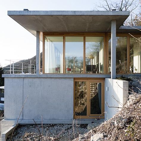 Gian Salis’ first stand-alone build was the House on a Hillside in Whylen in 2013, four years after the young Swiss architect set up his independent office in Zurich. Graduating from the prestigious ETH Zürich with a Masters degree in architecture, ... Slope Architecture, House On A Slope, Houses On Slopes, Slope House Design, House On Slope, Sloping Lot House Plan, Slope House, Hillside House, Modern Villa Design