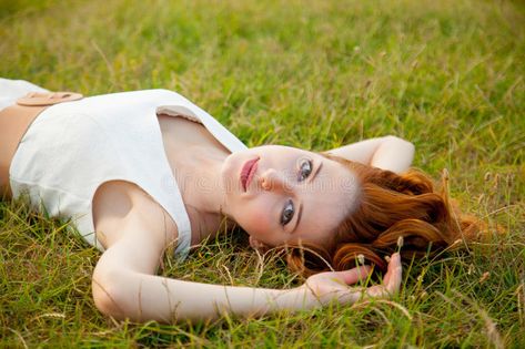 Photo of beautiful young woman lying in the field and relaxing. Beautiful young , #sponsored, #young, #woman, #Photo, #beautiful, #relaxing #ad Laying Down Perspective Drawing, Head Lying Down Reference, Lay Down Pose Drawings, Irene Rudnyk Photography, Woman Laying Down Drawing Pose Reference, Person Lying On The Floor Reference, Woman Reaching Out Reference, Woman Laying On Side Reference, Lying On The Ground Reference