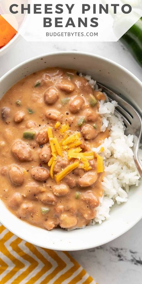 Cheesy Pinto Beans are a quick and satisfying meal made with simple pantry staple ingredients, like canned beans. Cheesy Pinto Beans, Pinto Beans With Ground Beef, Beans With Ground Beef, Pinto Bean Recipes, Simple Pantry, Beans And Rice, Canned Beans, Beef Recipe, Pinto Beans