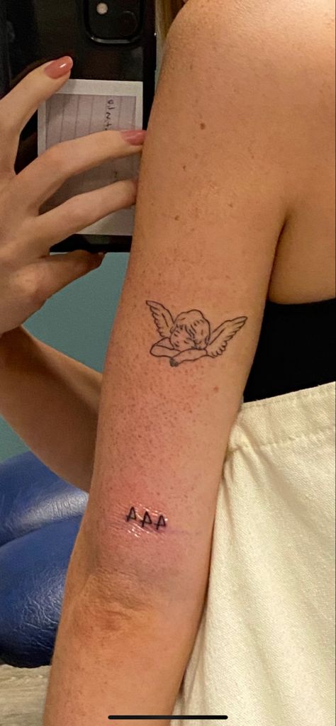 Cherub Tattoo Back Of Arm, Mini Cherub Tattoo, Sunday Tattoo Design, Cherub Tattoos For Women, Cherub Tattoo Back, Minimalist Cherub Tattoo, Cherub Outline Tattoo, Cherub Tattoo Fine Line, Classy Womens Tattoos