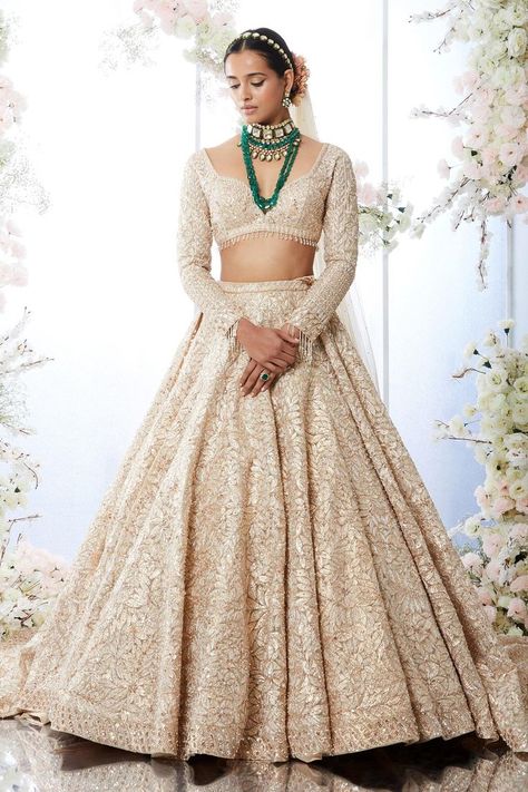 Buy #rose #gold #lehenga featuring all-over gota with #crystal, #pearl, #sequin work. Paired with full #sleeves #blouse & an #embroidered #dupatta by #SeemaGujral at #AzaFashions Shop online now at #Azafashions.com Call +91 8291990059 or email contactus@azafashions.com for enquiries. #wedding #festive #ethnic #tradional #shopping #shoponline #party #reception #bride White Lehnga Outfit Jewellery, Rose Gold Lehenga, Trail Lehenga, Full Sleeves Blouse, Ivory Lehenga, Golden Lehenga, Lehenga Ideas, Seema Gujral, Gold Lehenga