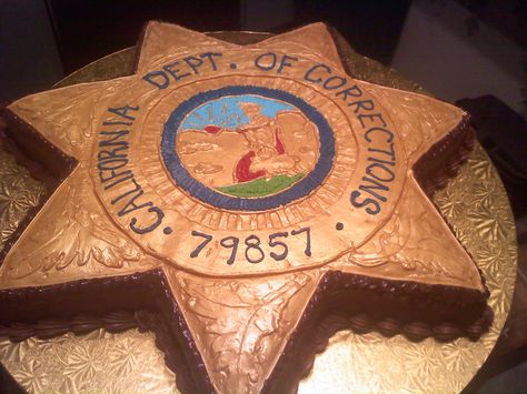 correctional officers badge - all buttercream iced cake and everything done by hand. I let it dry a bit then painted in gold luster. Officer Party, Police Cakes, Police Retirement Party, Corrections Officer, Iced Cake, Police Party, Grooms Cakes, Retirement Ideas, Retirement Party Decorations