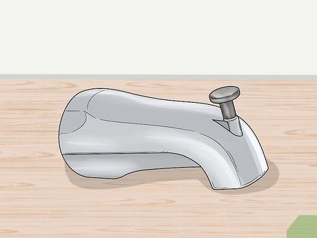 How to Change a Bathtub Faucet: 14 Steps - wikiHow How To Replace Bathtub Faucet, Replace Bathtub Faucet, Replace Bathtub, Old Bathtub, Bathroom Repair, Bathtub Spout, Diy Handyman, Water Spout, Retro Living Rooms