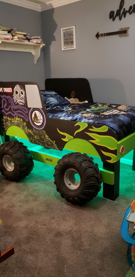 Cool Kid Beds For Boys, Cars And Trucks Themed Bedroom, Monster Trucks Room Decor, Toddler Boys Bedroom Ideas Car, Hotwheel Room Ideas, Hot Wheel Bedrooms, Hotwheel Bedroom Ideas, How To Organize Monster Trucks, Monster Truck Bed Frame