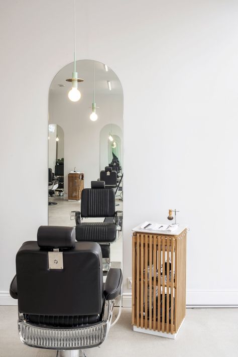 Ivy Studio uses simple furnishings to create barbershop in Montreal