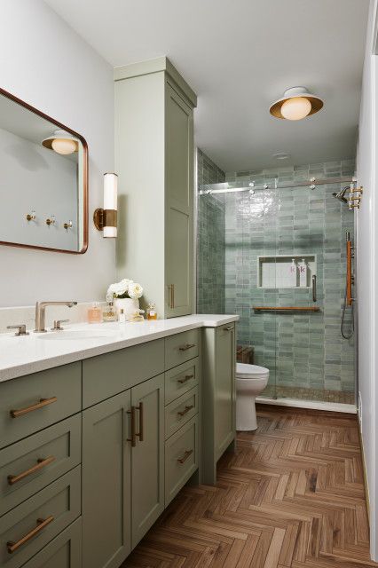 Bathroom of the Week: Warm Spa Feeling in 60 Square Feet Green Bathroom Cabinets, Green Vanity Bathroom, Double Closet Doors, Green Vanity, Shower Door Hardware, Timeless Bathroom, Brown Floors, Transitional Bathroom, Brown Bathroom