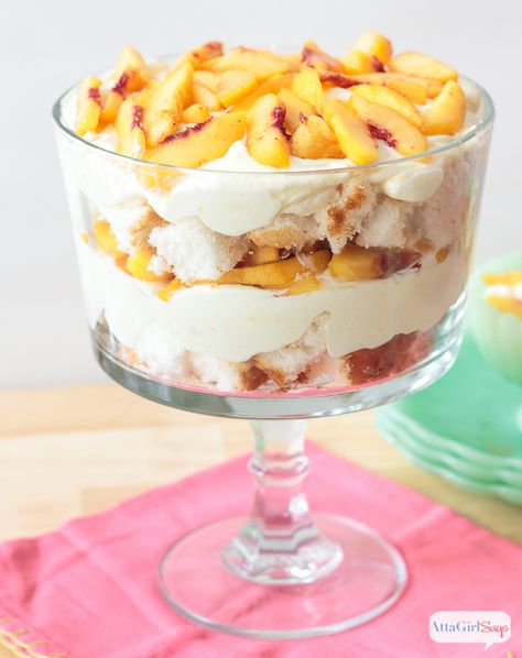 This peach trifle icebox cake, made with fresh, seasonal peaches, angel food cake and sweetened condensed milk, is the perfect summertime dessert. It's a light and airy confection, featuring vanilla, almond and peach flavors. It's an easy recipe that can be made ahead of time and kept in the refrigerator until you're ready to serve. Angel Food Cake Trifle, Peach Trifle, Trifle Bowl Recipes, Trifle Dessert Recipes, Angel Food Cake Desserts, American Honey, Trifle Bowl, Trifle Desserts, Peach Desserts