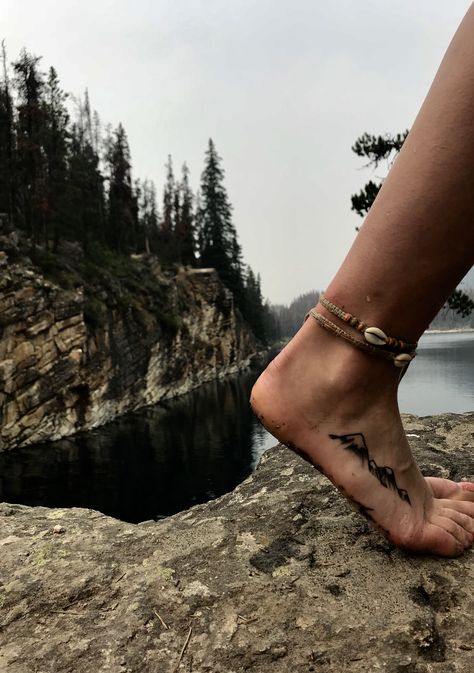 Cave Tattoo Women, Outdoor Tattoos Women, Outdoorsy Tattoos Nature Women, Nature Ankle Tattoo, Petoskey Stone Tattoo, Mountain Foot Tattoo, Mountain Tattoo Ankle, Earthy Tattoos Nature Simple, Granola Girl Tattoo