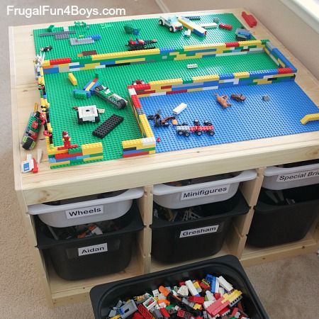 There are SO many awesome ideas for LEGO® tables out there, and yet despite all the Legomaniacs in our house we have never had one!  The boys mostly build with LEGO®s on the floor, but when I saw this idea on Pinterest to create a LEGO® table from IKEA Trofast shelves, I knew it would … Table Lego Diy, Ikea Lego Table, Diy Storage Table, Table Lego, Lego Table With Storage, Lego Table Ikea, Trofast Ikea, Lego Table Diy, Ikea Trofast