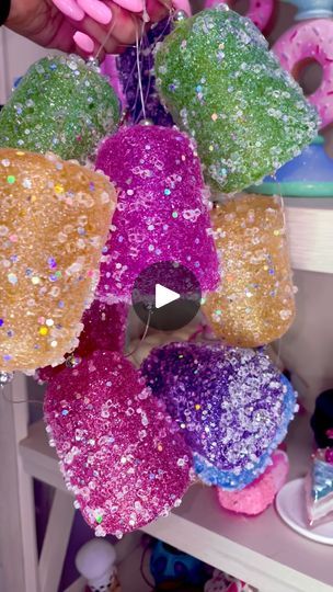 1.2K reactions · 86 shares | You can’t have the ornaments without the Jumbo Faux Sugared Gumdrop Garland to match!! 🩷  Our Jumbo Faux Sugared Gumdrop Garland brings that nostalgic, candy-coated Christmas charm into your home. Perfect for draping over mantels, spiraling up staircases, or adding whimsy to any festive nook! 🍬  🎄🍭 Bring a sugary sparkle to your holiday decor this Christmas season with our uniquely crafted, oversized gumdrop garland. Whether you’re creating a Candyland Christmas or adding a playful pop of color, this garland is your must-have!  🩷❤️🧡💛💚🩵💙💜🤍🩷❤️🧡💛💚🩵💙💜🤍🩷❤️🧡💛💚🩵💙💜🤍🩷❤️🧡💛💚🩵💙💜🤍🩷❤️🧡💛💚🩵💙💜🤍🩷❤️🧡💛💚🩵💙💜🤍🩷❤️🧡💛💚🩵💙💜🤍🩷❤️🧡💛💚🩵💙💜🤍🩷❤️🧡💛💚🩵💙💜🤍🩷❤️🧡💛💚🩵💙💜🤍🩷❤️🧡💛💚🩵💙💜🤍🩷❤️🧡💛💚🩵💙💜🤍  #dunndeals #nut Diy Gumdrops Decorations, Candyland Christmas Decorations Diy, Gumdrop Decorations, Gumdrop Garland, Diy Candyland Christmas Decorations, Candy Land Decorations, Nostalgic Candy, Fireplace Mantel Decor, Candyland Christmas