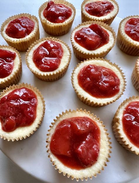 Mini strawberry cheesecakes are made in a muffin pan with cupcake liners and qualify as the perfect individual sized treat. Creamy on the inside, and topped with a fresh strawberry mixture, you’re going to fall in love with them in no time! Strawberry Cheesecakes, Mini Strawberry Cheesecake, Strawberry Topping, Strawberry Sauce, Cupcake Pan, Mini Cheesecakes, Cupcake Liners, Graham Cracker Crust, Easy Baking Recipes