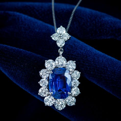 New in! A marvellous sapphire diamond pendant necklace boasting a deep-blue cushion cut sapphire in the centre, weighed at 2.91 carats. It’s complemented by a frame of twelve bright, clean brilliant-cut diamonds and four more on the bale above. They have excellent VS1 clarity - H colour and total 2.57 carats. The pendant is fashioned in 900 platinum and features a fancy, basket under-gallery on the reverse, stamped with the stone weights. It’s accompanied by a silky box chain to display it ... Sapphire Pendant Necklace, Sapphire Diamond Pendant, Edwardian Engagement Ring, Sapphire Necklace Pendants, Edwardian Jewelry, Edwardian Style, Sapphire Pendant, Blue Cushions, Edwardian Fashion