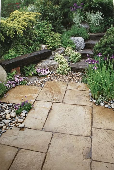 Charming Garden Walkways: Enhance Your Outdoor Space with Beautiful Paths"   Create a stunning garden with charming garden walkways that add both beauty and functionality to your outdoor space. From stone paths to lush greenery, these ideas will inspire you to design a walkway that complements your home decor while providing a peaceful journey through your garden. Country Courtyard Garden, Paving Ideas Outdoor Small Area, Paved Courtyard Ideas, Small Garden Paving Ideas, York Stone Patio, Courtyard Paving Ideas, Shingle Garden Ideas, Cottage Courtyard Garden Ideas, Garden Paving Ideas Inspiration