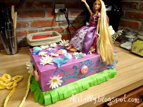 shoebox float | And here she is! Alice’s Spring Parade Shoebox Rapunzel Float!! Fiesta Float Ideas For School, Shoebox Mardi Gras Float, Floats For Parade, Shoebox Parade Float, Float Book, Shoebox Float Ideas, Shoe Box Float, Kids Parade Floats, Fiesta Float