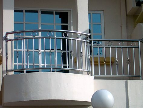 banister? Steel Grill Design, Steel Stair Railing, House Front Wall Design, Iron Balcony Railing, Steel Railing Design, Modern Stair Railing, Front Wall Design, Glass Balcony, Balcony Grill