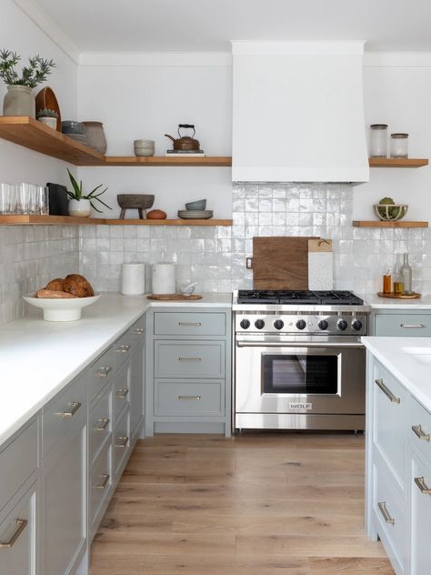 Pennsylvania Avenue | Salt Design Company Kitchen Hood Floating Shelves, Kitchen Shelves Next To Extractor, Kitchen Shelves Around Hood, Kitchen Vent Hood With Floating Shelves, Blue Kitchen Black Hardware, Tiled Extractor Hood, Kitchen Hood Open Shelves, Tile Backsplash Open Shelving, Blue Kitchen Cabinets White Appliances