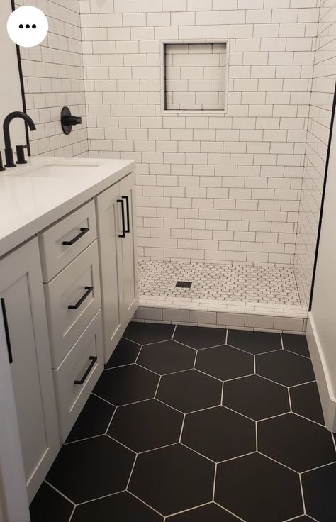 Charcoal Gray Hexagon Tile Bathroom, Black Hexagon Flooring Bathroom, Black Tile Bathroom Floor White Vanity, Black And White Bathroom Hexagon Tile, Black Floor Small Bathroom, Remodled Bathrooms Ideas, Black Restroom Floor Tile, Bathroom Remodel Hexagon Tile Floor, Black Hexagon Tile Bathroom Floor Ideas