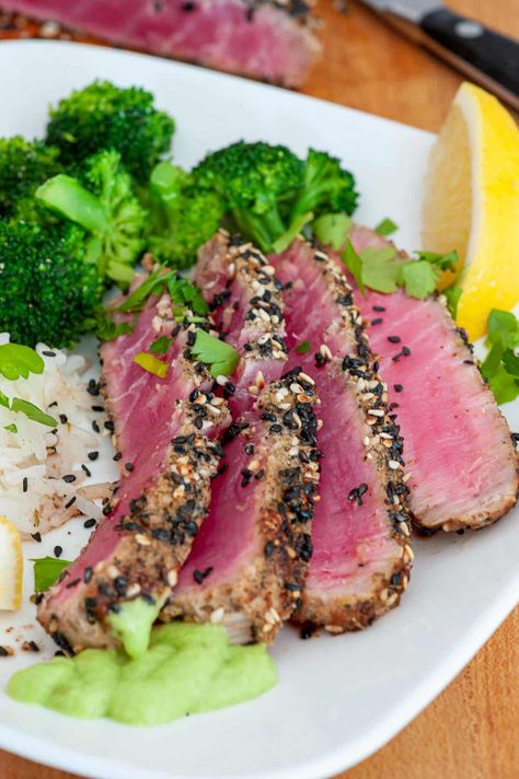 This seared tuna steak recipe is all you will need for perfectly seared sesame crusted tuna. This tuna steak only takes minutes to sear for perfectly done ahi tuna steaks. Tuna Filet Recipes, Fresh Tuna Steak Recipes, Tuna Steak Dinner, Cooking Ahi Tuna, Pan Seared Tuna Steak, Seared Tuna Steak, Grilled Tuna Steaks Recipes, Seared Tuna Recipe, Fresh Tuna Recipes