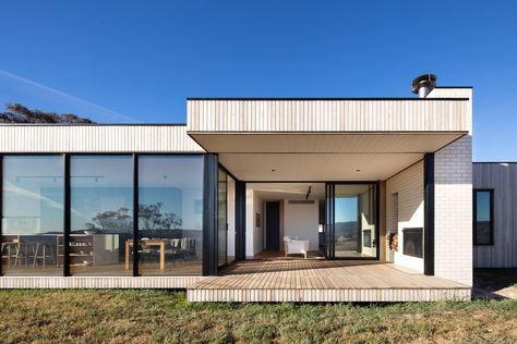 An Affordable Prefab Home Frames the Rugged Landscape in Rural Australia White Brick Tiles, Affordable Prefab Homes, Prefab Buildings, Brick Siding, Timber Shelves, Steel Framing, House Fan, Prefab Homes, Modular Homes