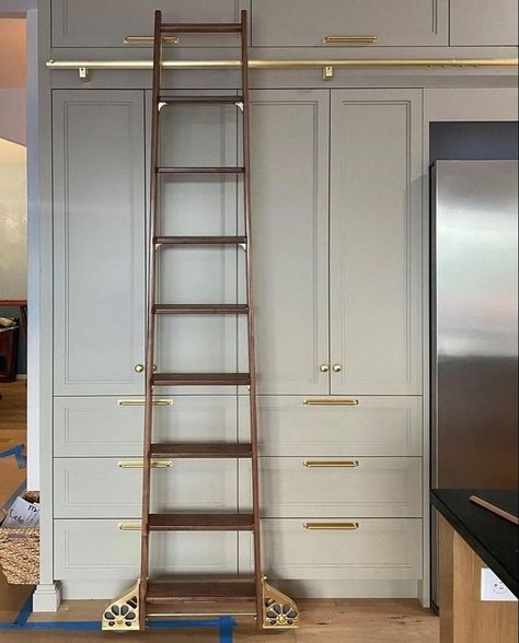 Ladder Built Into Wall, Kitchen With Ladder Cabinets, Library Ladder Kitchen Upper Cabinets, Library Ladder Closet, Kitchen With Sliding Ladder, Sliding Ladder Kitchen, Kitchen Sliding Ladder, Kitchens With Ladders, Closet With Library Ladder