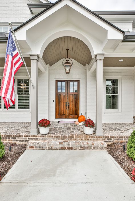 Custom home built by Harrison Homes. Love the tongue-in-groove curved ceiling portico. Adding Portico To Front Of House, Curved Portico, Porch Gable, Updated Colonial, Curved Ceiling, Arch Entryway, Exterior Entrance, Barrel Vault Ceiling, Home Entry