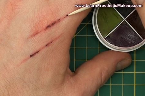 A quick video tutorial that demonstrates how to simply create realistic scratches using basic kit! -------------------------------------------------------------------------          If you like this kind of thing, be sure to check out: My site (where you can get free tutorials and a free mini ecourse): http://www.learnprostheticmakeup.com/   My blog: http://www.learnmakeupeffects.com/blog/   My full-on ecourse: http://www.learnmakeupeffects.co... Scratches Makeup Halloween, Fake Scratches Makeup, Fx Makeup Wounds, Fake Scratch Makeup, Fake Scar Makeup Tutorials, Scratch Makeup Halloween, Pirate Makeup Tutorial, Fake Scar Makeup, Burn Makeup Special Effects