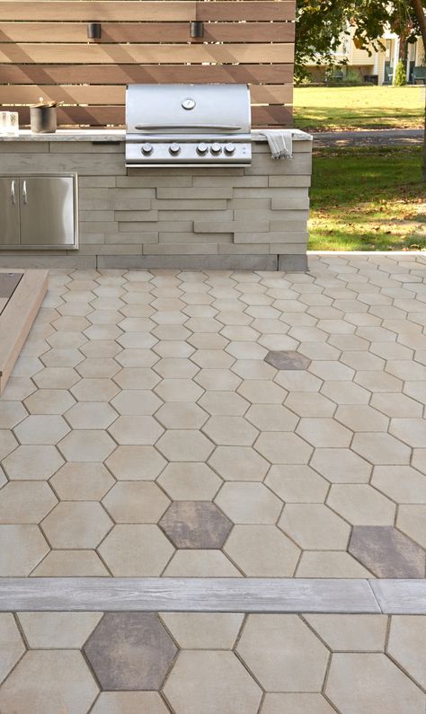 This backyard patio idea is inspired by our Hexa 60 patio slab. Inspired by the traditional hexagon paver, the Hexa 60 adds a modern twist to its predecessor. This patio slab is taking center stage in landscaping, providing a unique geometric look that blends seamlessly in modern outdoor spaces. From patios, to walkways and any other pedestrian-friendly environment, the Hexa 60 will add instant visual appeal to any exterior! Check out our website to shop the look! Hexagon Paver Patio Ideas, Hexagon Outdoor Pavers, Modern Paver Patio, Slabs Garden Patio, Hexagon Patio, Diy Stone Patio, Driveway Lights, Diy Concrete Patio, Backyard Goals