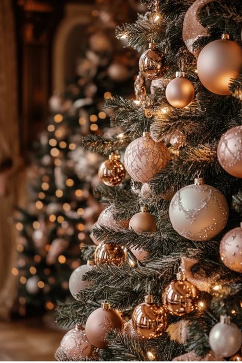 Create the Perfect Rose Gold Christmas Tree | My complete guide to tree decorating with the perfect ornament placement, lighting tips, and color combinations. Plus where to find the best rose gold decorations! Click to read more. Some of the links in my articles are affiliate links. If you make a qualified purchase from one of my links I will make a small commission at no cost to you. Thank you for your support!!! Gold Rose Gold Christmas Tree, Rose Gold Tree Decorations, Rose Gold Xmas Tree, Ornament Placement, Christmas Tree Rose Gold, Gold Tree Decorations, Rose Gold Decorations, Christmas Tree Roses, Rose Gold Christmas Tree