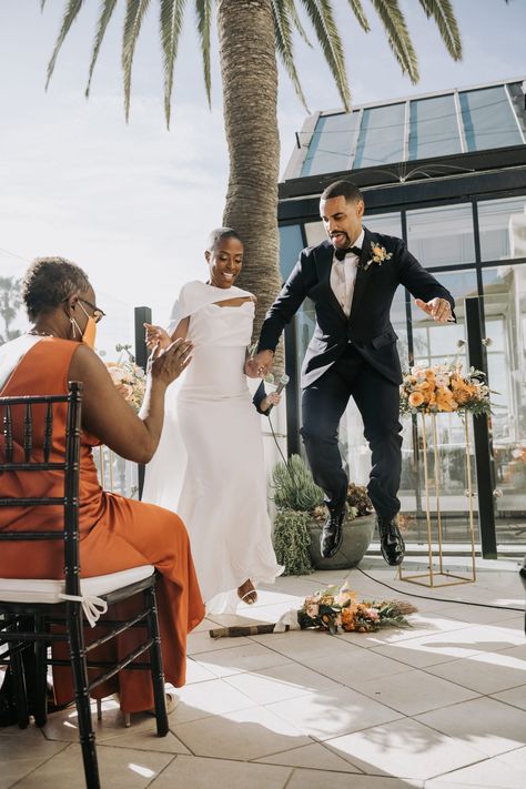 Jumping the Broom Jumping The Broom Wedding, Jump The Broom, Jumping The Broom, Floral Wedding Cake, Socal Wedding, Ocean Views, Walking Down The Aisle, Memorable Moments, Black Love