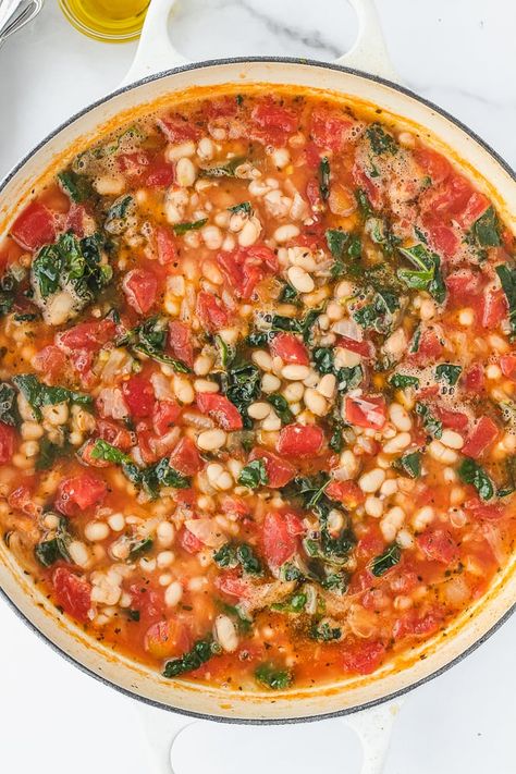 These Quick White Beans with Tomatoes & Kale are simple, delicious and comforting. Using canned beans makes this recipe easy and quick to cook for dinner. Roasted Tomatoes And White Bean Stew, Tomato White Bean Kale Soup, Canned Canelli Bean Recipes, White Beans And Tomatoes Recipes, Tomato Kale Soup, Cannellini Beans And Tomatoes, White Beans In Tomato Sauce, Kale Tomato Recipes, Kale And Tomato Recipes