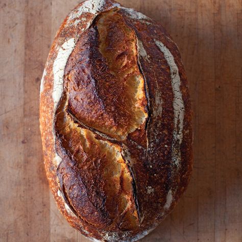 Chad Robertson of San Francisco's Tartine Bakery & Cafe describes a starter -- a mixture of flour, water, wild yeasts, and bacteria -- as a baker's fingerprint. Making one is simple, but it does require a commitment: Count on feeding and caring for the mixture for three weeks before you start baking. Tartine Bread, Country Bread, Dough Scraper, Loaf Of Bread, Sourdough Recipes, White Bread, House Garden, Sourdough Bread, Martha Stewart