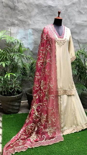 Andaaz Boutique on Instagram: "@labelandaaz ❤️ “Introducing this exquisite gold and Rani sharara suit, meticulously crafted with stunning zardosi work on golden tissue fabric, paired with a contrasting Dupatta. Perfect for the grace of mehndi, the rhythm of sangeet, and the splendor of the wedding day. Contact us now to make this yours! WhatsApp at 9779057027.”" Punjabi Weddings, Tissue Fabric, Zardosi Work, Golden Dress, Sharara Suit, Punjabi Wedding, The Grace, Wedding Party Dresses, Party Dresses