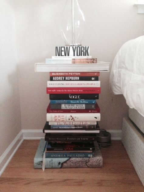 Bedside Table Stack of Books Stacked Books As Side Table, Books Side Table, Books As Nightstand, Stacks Of Books Aesthetic Bedroom, Books On Bedside Table, Book Stack Nightstand, Book Bedside Table, Bedside Table Books, Book Side Table