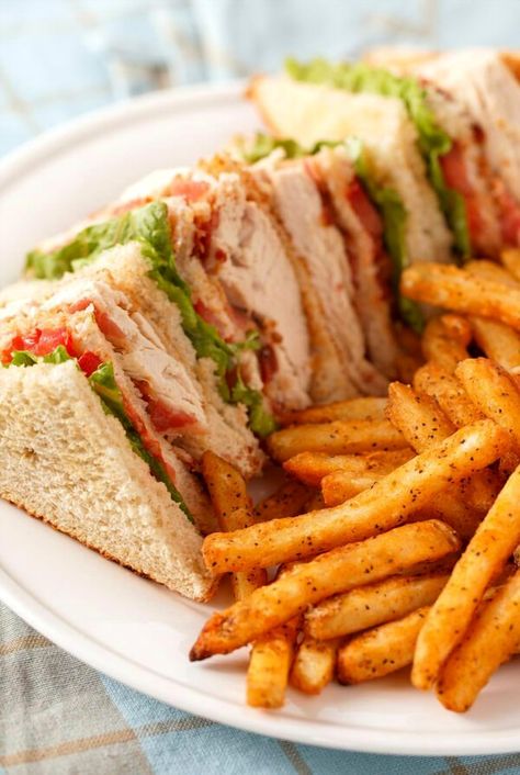 Indulge in the timeless flavors of a Classic American Club Sandwich, a true delight for sandwich lovers. This recipe from CDKitchen brings together layers of crisp bacon, juicy turkey, fresh lettuce, and ripe tomatoes, all nestled between perfectly toasted bread. Perfect for lunch or a casual dinner, this club sandwich offers a satisfying crunch and a burst of savory goodness in every bite. Whether you're hosting a gathering or enjoying a quiet meal at home, this classic dish is sure to impress and satisfy. Club Sandwich Recipe, Club Sandwich Recipes, Recipes Using Rotisserie Chicken, Recipes Using Ground Beef, Juicy Turkey, Turkey Club, Sandwich Platter, Hearty Snacks, American Club