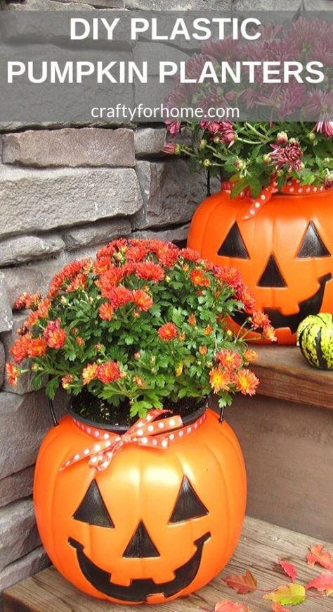 Pumpkin Mum Planter, Plastic Pumpkin Centerpieces, Plastic Pumpkin Decorating Ideas, Office Fall Decorations Ideas, Fall Office Decorations, Halloween Planters, Mum Planters, Pumpkin Flower Pots, Library Window