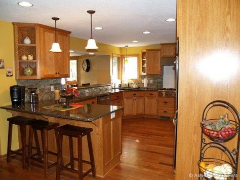 Custom oak kitchen cabinets Yellow Kitchens, Remodeled Kitchens, Yellow Kitchen Walls, Medium Kitchen, Kitchen Remodel Pictures, Honey Oak Cabinets, Yellow Paint Colors, Painting Oak Cabinets, Farmhouse Backsplash