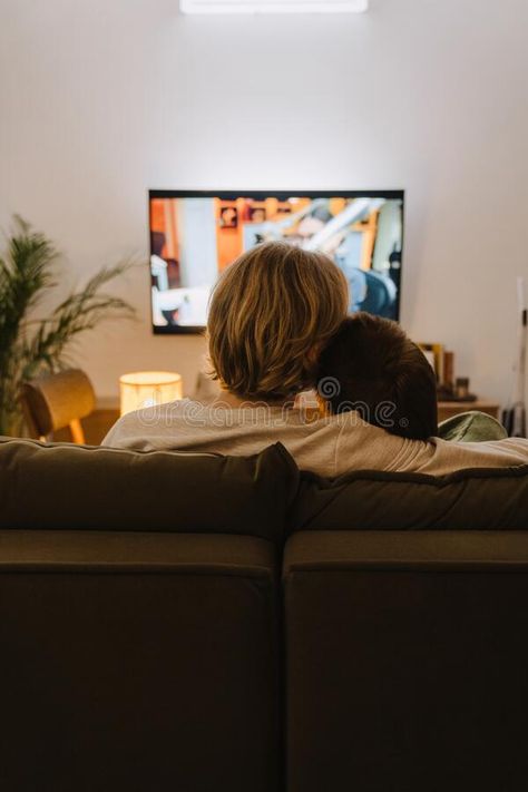 Young gay couple hugging and resting on couch while watching tv royalty free stock images Couple Hugging On Couch, Couch Cuddle Aesthetic, Couple Watching Movie On Couch, Couples Watching Tv, Couple Watching Tv Aesthetic, Couple On A Couch, Couple Watching Tv, Watching Tv Together, Body References