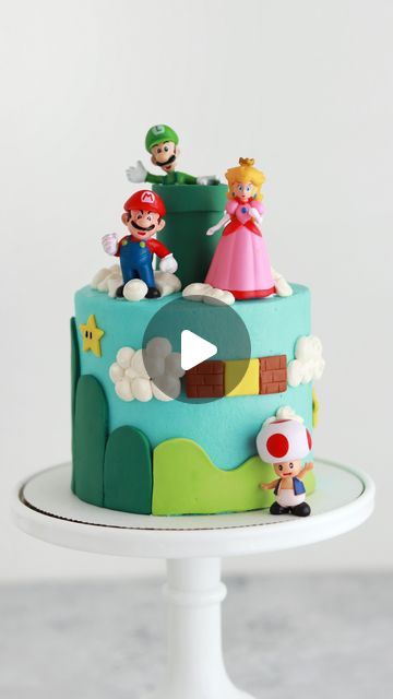 Whitney DePaoli | Sugar & Sparrow on Instagram: "Mini Super Mario Cake 🍄 ⭐️ this was one of three family birthday cakes I had the honor of making this past week! I handmade the landscapes, pipe, stars, blocks, and other little details with fondant + found the tiniest Mario figurines on Amazon to round out the theme. Happy birthday, sweet Lydi! ⁣ ⁣ #supermario #mario #mariocake #birthdaycake #cakesofinstagram #minicake #cakedecorating #cake #bakingfun" Simple Mario Cake, Mario Birthday Party Cake, Mario Theme Cake, Mario Cake Ideas, Mario Themed Cake, Cake Super Mario, Super Mario Birthday Cake, Super Mario Bros Cake, Mario Birthday Cake