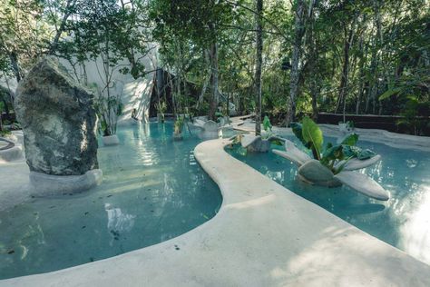 The grounds feature meditative pools. - photo: Courtesy of Azulik Azulik Tulum, Covered Walkway, Beautiful Ruins, Eco Hotel, Yucatan Mexico, Yucatan Peninsula, Organic Architecture, Tulum Mexico, Photo Tree