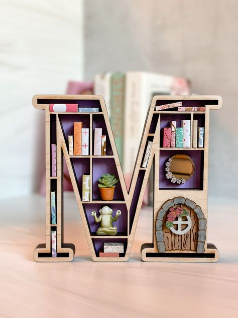 Excited to share this item from my #etsy shop: Mini Bookshelf, 3-D Wood Mini Bookshelf, Letter Bookshelf, Book Lover Gift, Mini Books, Book Lover, Book Lover Wall Decor, Laser Cut #letterbookshelf #bookwalldecor #booklovergift #homedecor #3dbookminibooks #3dbookshelf #teachergift #giftforreader #booklovegift Mini Bookcase Diy, Book Gifting Ideas, Mini Book Library, Mini Book Shelf Ideas, Mini Bookshelf Diy, Mini Book Shelf, Book Wall Decor, Bookshelf Decorating Ideas, Mini Bookcase