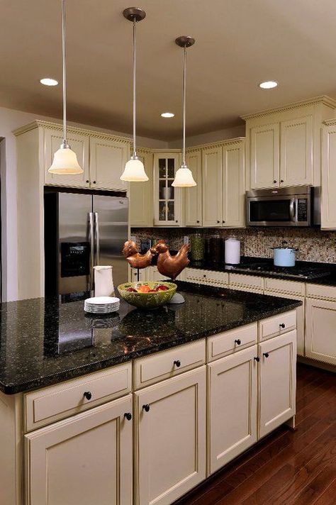 Dark Granite Countertops, Cream Cabinets, Dark Countertops, Black Granite Countertops, Black Countertops, Farmhouse Kitchen Cabinets, Kitchen Cabinets Decor, Marble Counter, Dark Kitchen Cabinets