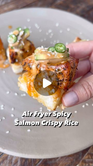 Sarah Thomas on Instagram: "Air Fryer Spicy Salmon Crispy Rice 🍣 If you love cooked sushi, then you have to try my air fryer spicy salmon crispy rice. The rice is crispy on the outside and tender in the center, topped with my FAMOUS spicy salmon bites and spicy creamy sauce, you’re going to LOVE this recipe. Let me know if you give it a try! Google Search “Healthyish Spicy Salmon Crispy Rice” or click the link in my bio to grab the full recipe. #airfryer #salmon #sushi #spicyfood #rice #asmr #asmrfood #food #trending #viral" Crispy Rice Salmon Bites, Spicy Salmon Bites, Spicy Salmon Crispy Rice, Salmon Crispy Rice, Airfryer Salmon, Salmon Crispy, Cooked Sushi, Salmon Tartare, Spicy Crab