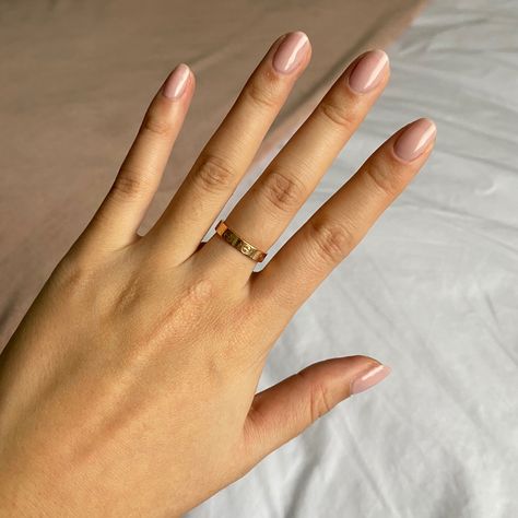 light pink gel polished short nails and a slim 18k pink gold cartier love ring / wedding band Love Wedding Band Cartier, Cartier Love Ring Aesthetic, Cartier Love Ring Gold, Cartier Love Ring Wedding, Cartier Love Ring Wedding Band, Love Ring Wedding Band, Love Ring Cartier, Cartier Wedding Band, Cartier Love Band