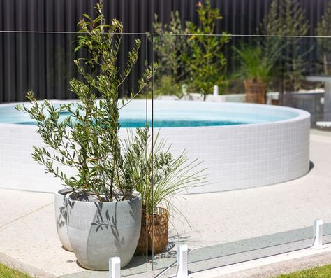 ✨ This backyard renovation is a vision of elegance. Featuring our White Spigots, Custom curved rod fencing, and Frameless Glass pool fencing that harmonise beautifully with the white-tiled plunge pool. 💙🌿 ☎️ Call 1300 71 81 92 to discover white, or many of our other colour pool fencing options. . . . #WhiteDelight #BackyardOasis #PoolsideParadise #poolfencing #curvedpoolfencing #whitehardware #whitespigots White Metal Pool Fence, Metal Pool, Fencing Options, Glass Pool Fencing, Backyard Renovation, Pool Fencing, Glass Fence, Glass Pool, Backyard Renovations