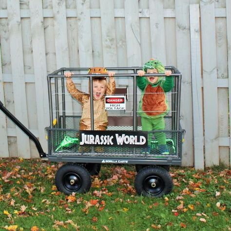 Diy Dinosaur Cage Wagon, Jurassic Park Halloween Wagon, Wagon Costumes For Kids, Halloween Costumes For One Year Old Boy, Dinosaur Cage Wagon Halloween, Diy Jurassic Park Wagon, Dinosaur Wagon Costume, Halloween Costumes 3 Year Boy, Wagon Costumes For Babies