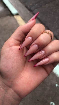 These stiletto-shaped nails offer a daring and sleek look. They feature a glossy nude pink color that transitions smoothly into sharp white tips, creating an elegant and modern take on the classic French manicure. The nails are finished with a shiny top coat for an extra touch of sophistication. Simply stunning!✨ // Photo Credit: Instagram @nailedmyset Sharp French Nails, Stiletto French Tips, Stiletto Shaped Nails, Pink French Nails, White Tips, Shaped Nails, Classic French Manicure, Nails Aesthetic, White Tip