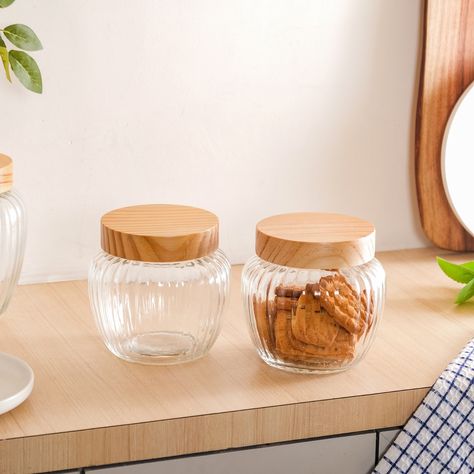 Green storage with style! 🫙💚 Store your goodies in our kitchen jars that reeks of sustainability without compromising on looks and utility. 😍 Products featured: 1. Set Of 2 Glass Jars With Wooden Lid 1600ml 2. Glass Storage Jars Set Of 2 With Wooden Lid 2200ml 3. Vintage Patterned Glass Jar With Lid Set Of 4 700ml 4. Glass Jar With Seal - Large 5. Glass Jar With Seal - Small 6. Glass Jar With Seal - Medium 7. Seasoning Jars With Lid Set Of 6 100ml 8. Glass Jar With Wooden Lid - Small #kitc... Jars With Wooden Lids, Indian Spice Box, Glass Jar With Lid, Perfect Pantry, Kitchen Jars, Spice Box, Glass Jars With Lids, Glass Storage Jars, Honeycomb Design