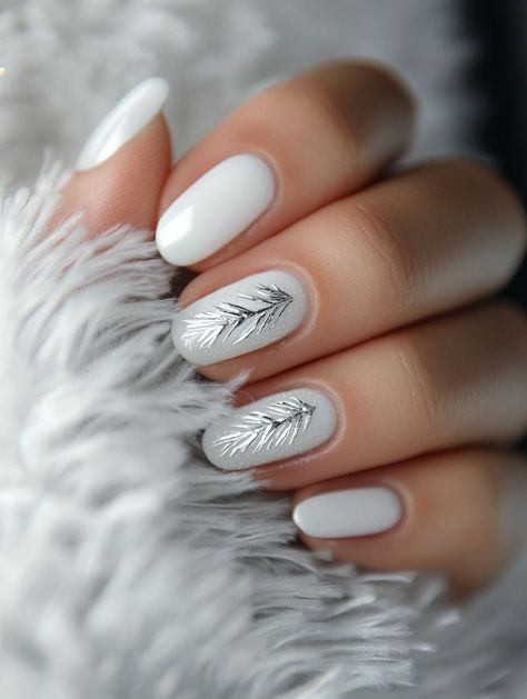 Embrace the cozy charm of the season with our array of 27 simple Christmas nail ideas. These understated yet merry designs prove that holiday style can be effortless. From minimalist snowflake accents to elegant metallic touches, these nails will spread festive cheer wherever you go. Christmas White Nails Almond, Nails Design 2025 Winter, Christmas Nail Elegant, Simplistic Winter Nails, Understated Holiday Nails, Cute Simple Winter Nails Short, Minimalist Holiday Nails Short, Snowflake Nails Almond Shape, Matte Christmas Nails Simple