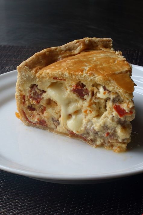 Chef John's Pizza Rustica | "Some people describe pizza rustica as an Italian meat-filled quiche, but I think this traditional Easter recipe is way closer to a savory cheesecake filled with a massive amount of goodness." #dinnerideas #dinnerrecipes #familydinnerideas #pizza #pizzarecipes #pizzaideas #homemadepizza Easy Pizza Rustica Recipe, Pizza Rustica Italian Recipe Giada, Pasta Rustica Recipe, Pizza Rustica Italian Easter, Pizza Rustica Italian Recipe, Pizzagaina Recipe, Frito Casserole, Easter Pizza, Italian Easter Pie